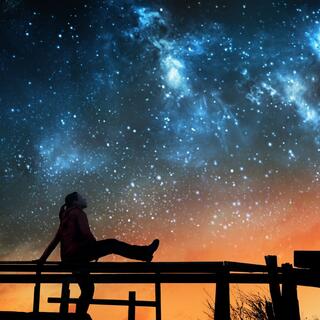 Girl looking at the night sky